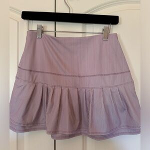 Lucky in Love Tennis Skirt in pretty purple/magenta stripe